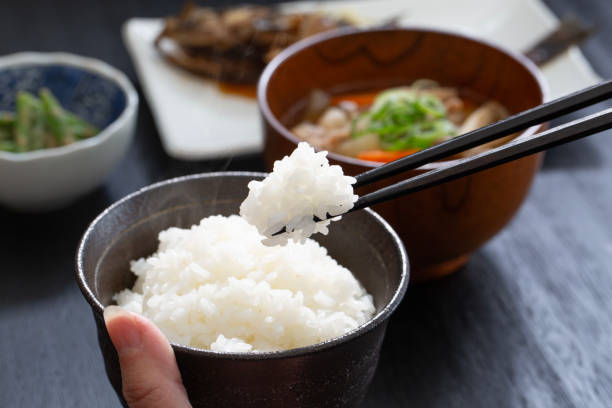 istock Japanese people eating, eating rice 1984619978