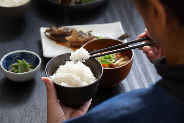 istock Japanese people eating, eating rice 1984619981