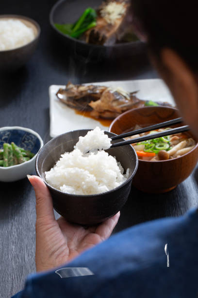 istock Japanese people eating, eating rice 1984619982