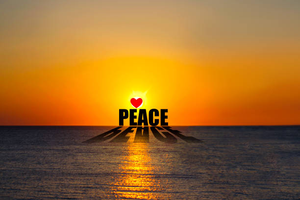 Peace. Word at sunset over the sea. Calm. Rest. Relaxation Background