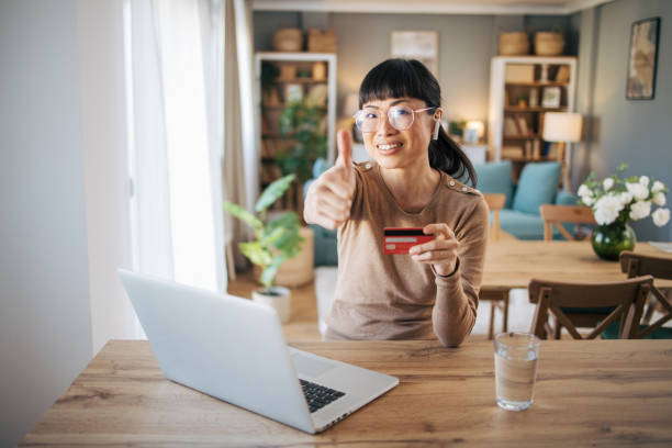 istock Female Japanese customer shopping online 1984637109