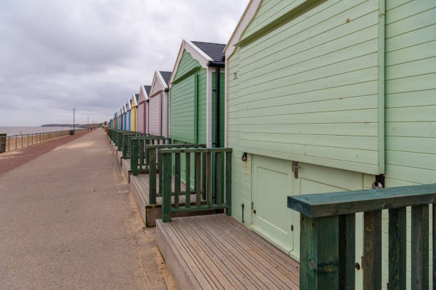 Colourful beach huts shut for winter, Gorleston, Norfolk, England