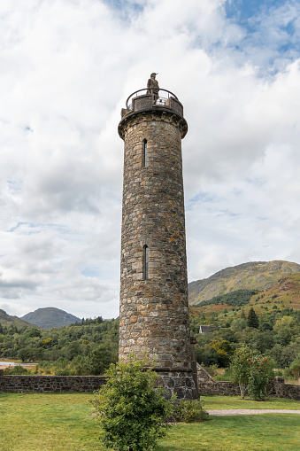 Statue of the Unknown Highlander at the top of the 1745 Jacobite rising memorial at Glenfinnan, Highlands, Scotland