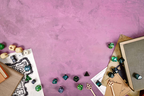 istock Tabletop role playing flat lay with colorful RPG dices, rule books, dungeon map 1984684012