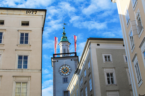 View of the clock tower on a day. Close-up. Salzburg. Austria.