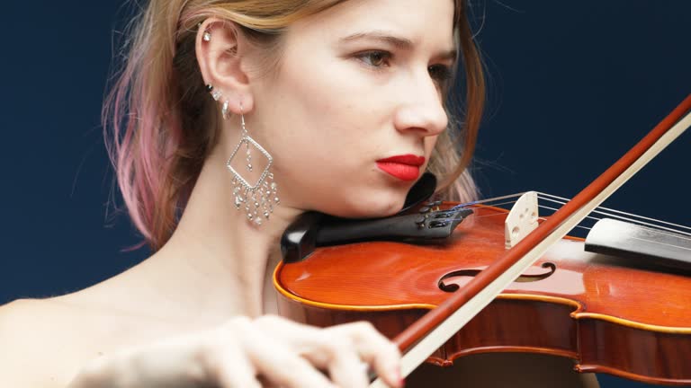 Concert gown violinist disturbed by performance flaw