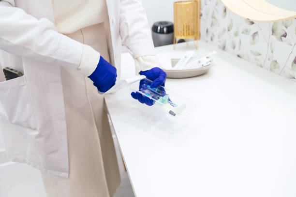istock Unrecognizable Medical Professional Preparing Aesthetic Injection 1984725134
