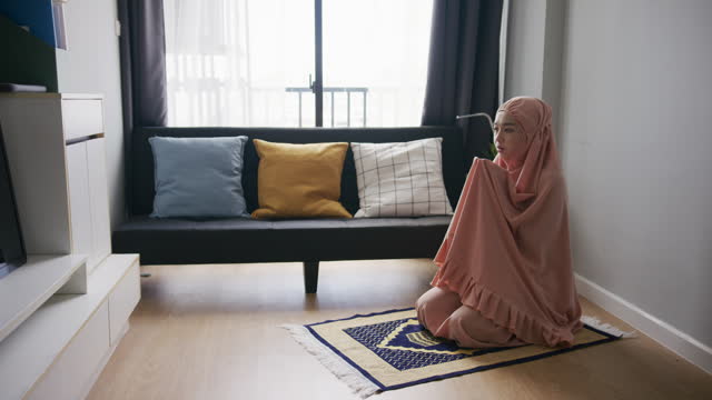 Muslim Woman Praying at home