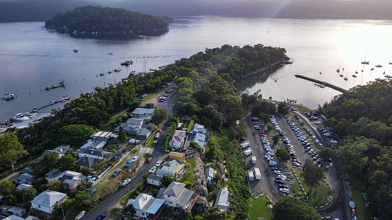 Aerial drone view of Brooklyn, NSW Australia and Hawkesbury River during the early morning in February 2024