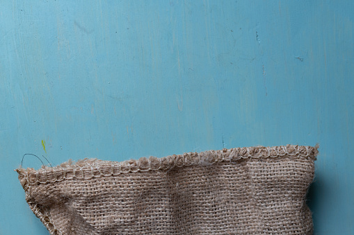 jute bag on blue background