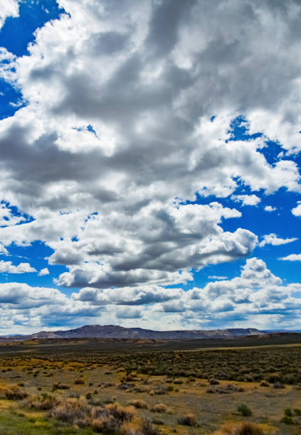 istock Rain clouds during the day over the plains in Utah, US 1984810925