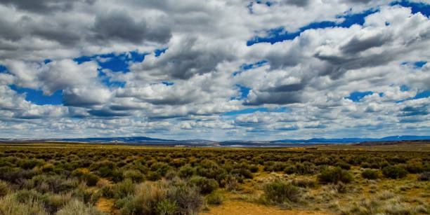 istock Rain clouds during the day over the plains in Utah, US 1984810933