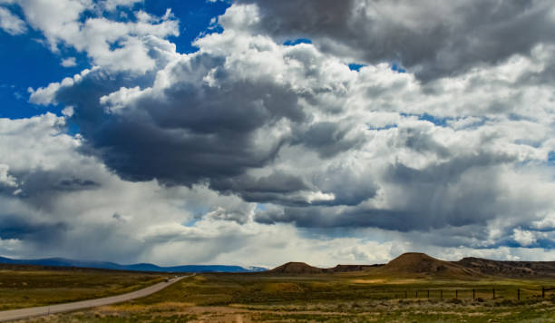 istock Rain clouds during the day over the plains in Utah, US 1984810936
