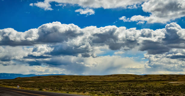 istock Rain clouds during the day over the plains in Utah, US 1984810944