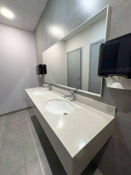 istock White washbasin with tap in the restroom 1984836671