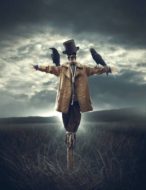 istock Evil scarecrow and dark cloudy sky 1984843461