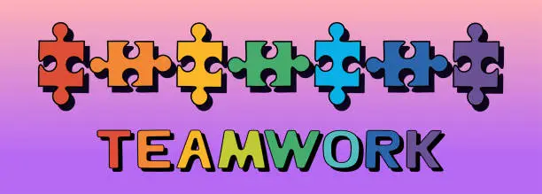 Vector illustration of Rainbow colored puzzle pieces and Teamwork inscription