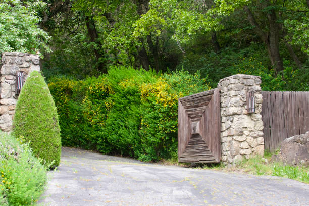 istock Weathered rustic wood gate at the driveway 1984849795