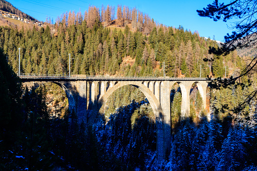 View of Wiesen Viaduct, Rhaetian railway, Graubunden in Switzerland at winter