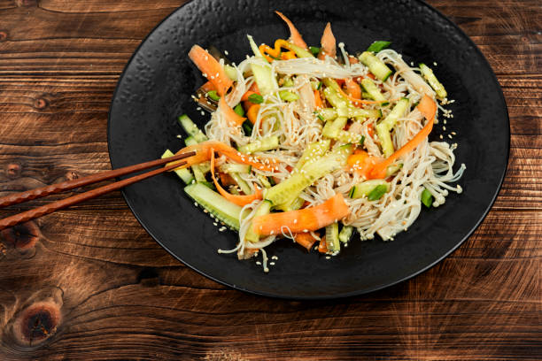 istock Chinese salad with enoki mushrooms. 1984865642