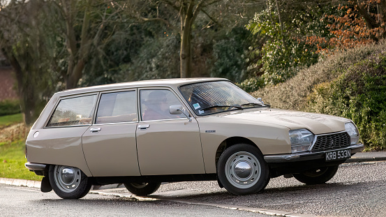 Milton Keynes,UK-Feb 4th 2024: ,1974,Citroen GS classic estate car driving on an English road.