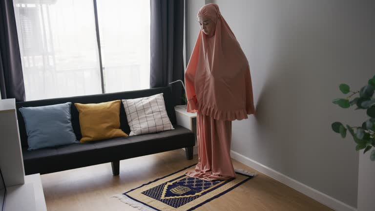 Muslim Woman Praying at home