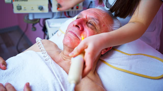 senior adult man in a spa for beauty treatments.