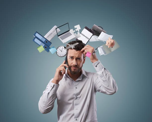 istock Stressed confused businessman having a phone call 1984896376