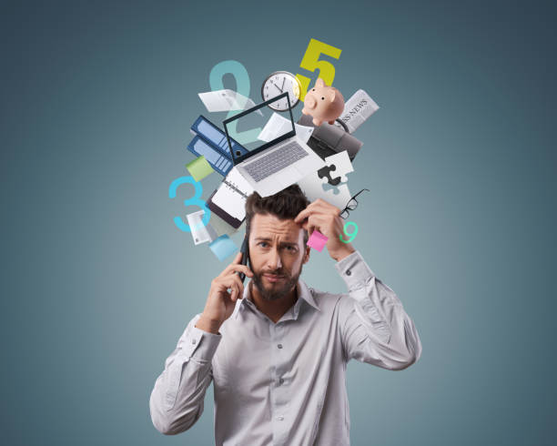 istock Stressed confused businessman having a phone call 1984897442