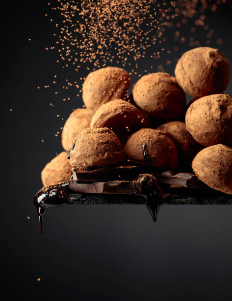 istock Chocolate truffles sprinkled with cocoa powder. 1984915815