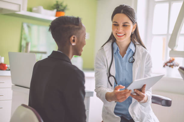 istock Doctor consulting her patient 1984939735