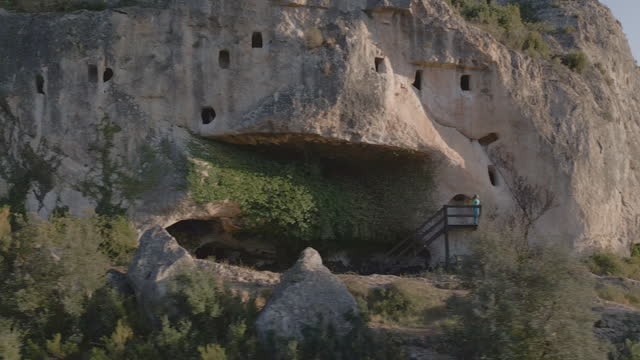 Caves carved into the rock in the Alfafara village, Alicante, Costa Blanca, Spain - stock video