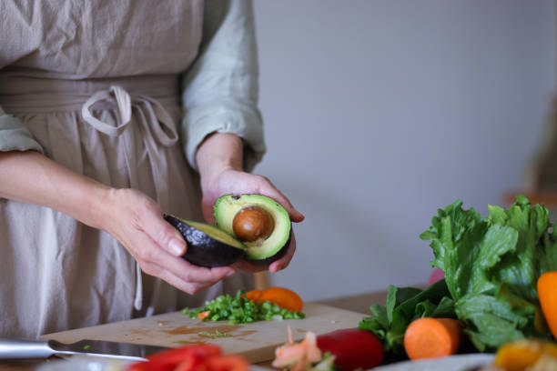 istock Woman making cooking class on smartphone mobile app 1985034043