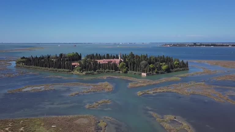 Aerial view of San Francesco del Deserto island and Franciscan monastery in Venetian Lagoon, Italy