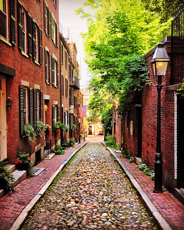 Acorn Street on historic Beacon Hill in the summer in Boston. Classic New England.