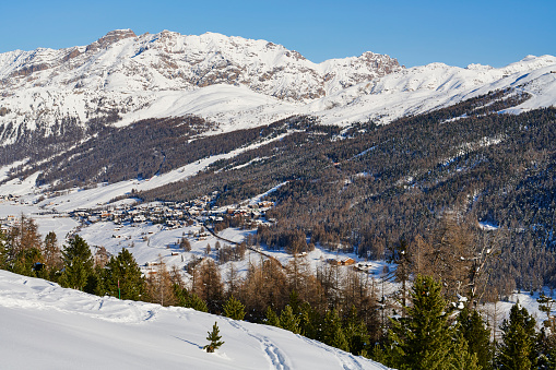 Day view of Livigno, a popular sky resort destination in the Italian Alps. Province of Sondrio. Italy.