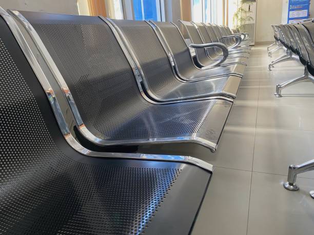 istock waiting room chairs in line at the office 1985076930