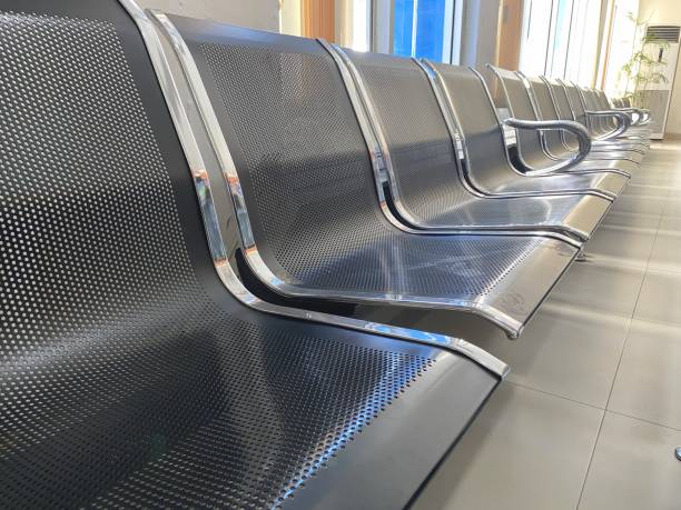 istock waiting room chairs in line at the office 1985077487