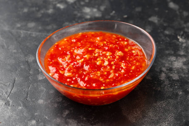 istock Hot Sweet chilli sauce in glass bowl 1985078025