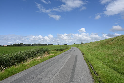 Little-used road on the Elbe dike near Cuxhaven, ideal for a bike ride