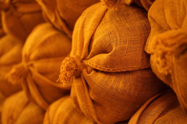 Multiple bags and sacks in matching color with secure ties,