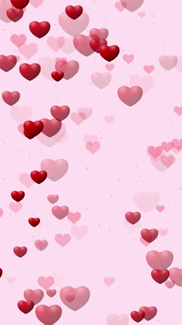 Red hearts pulsating on pink vertical background