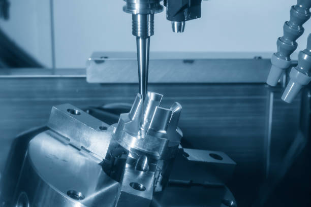 istock The 5-axis CNC milling machine  cutting the automotive part with solid ball end mill tool. 1985131592
