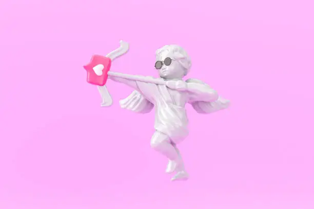 Photo of Statue of cupid with love icon. Valentine day concept. 3d rendering