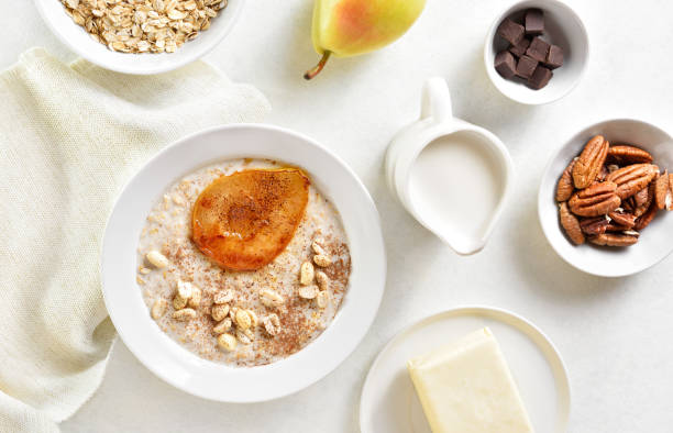 istock Oat porridge with caramelized pear and peanut 1985178866
