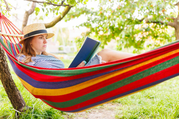 Free Stock Photo of Woman with colorful hair relaxing in hammock ...