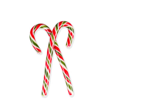 istock New Year's sticks candy canes with stripes on a white isolated background 1985216840