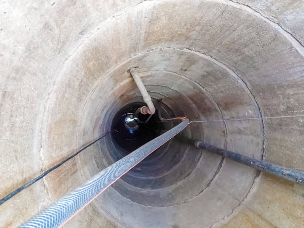 istock Well view from the inside. View from inside vertical tube downcast shaft 1985237355
