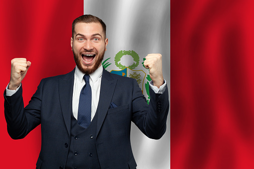 Perunian happy businessman on the background of flag of Peru Business, education, degree and citizenship concept