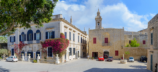 Corfu, Greece: Cityscape with residential buildings and a beautiful greek orthodox church in Corfu city.